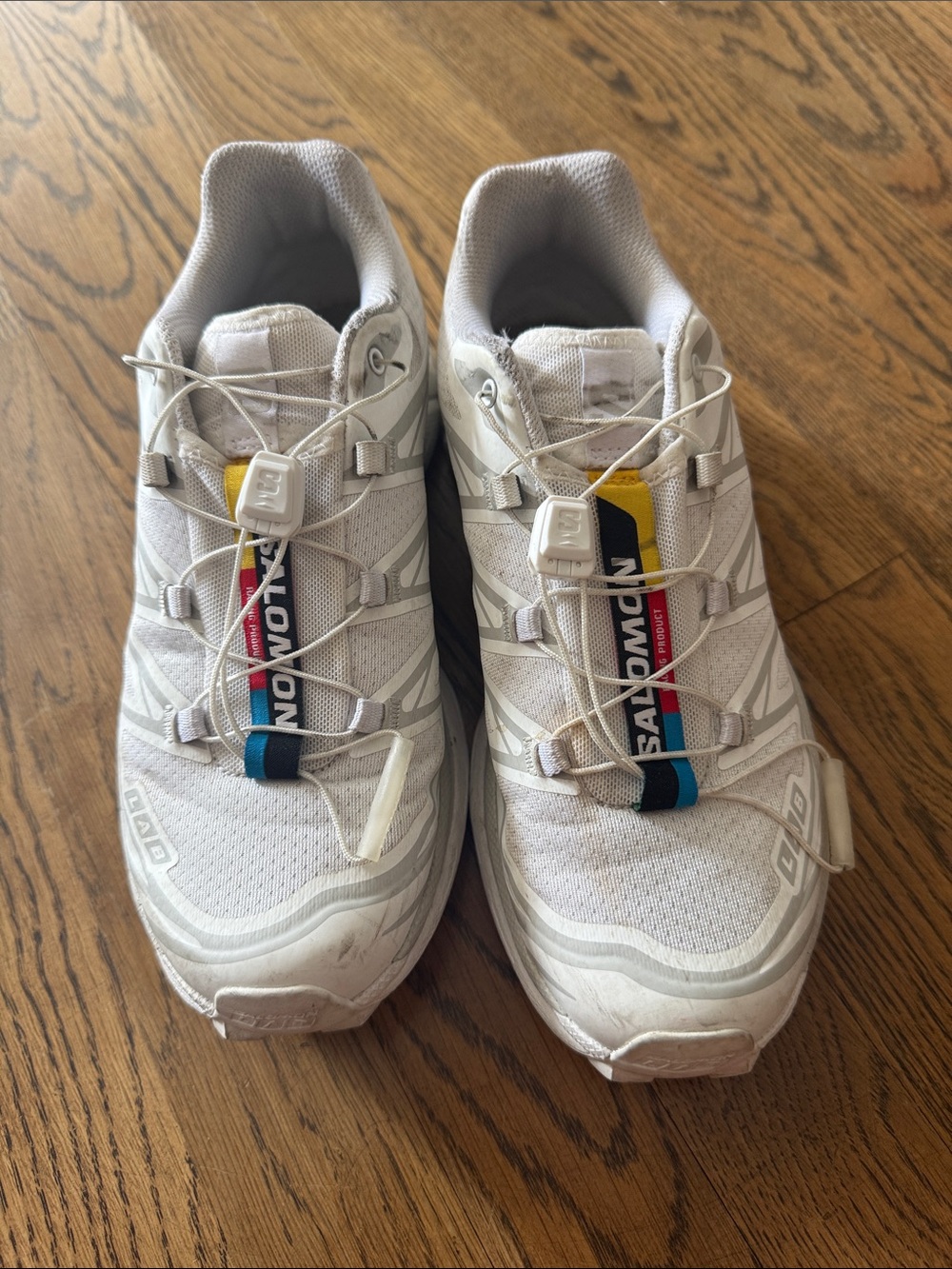 Salomon White Athletic Trail Shoes with Multicolor Branding